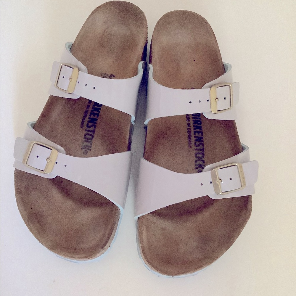 Birkenstock Two-Strap Sandals in White with Gold Buckles